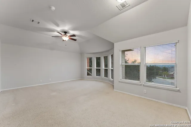 a large bathroom with a large tub sink and double vanity