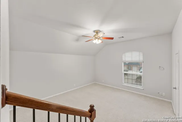a view of a street from a balcony