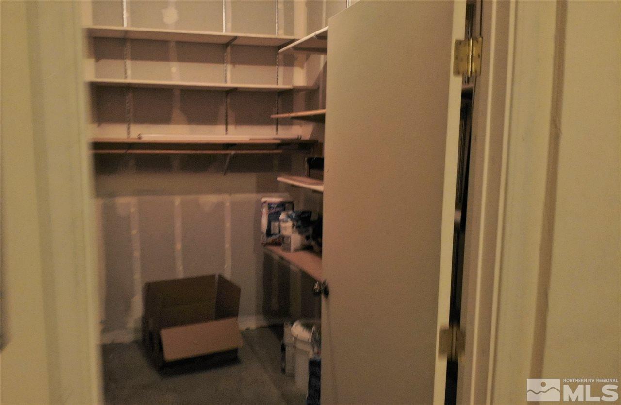 9050 Double R Boulevard, Unit 1612 Reno, NV 89521 - Photo 12 of 25 a view of closet area with empty racks