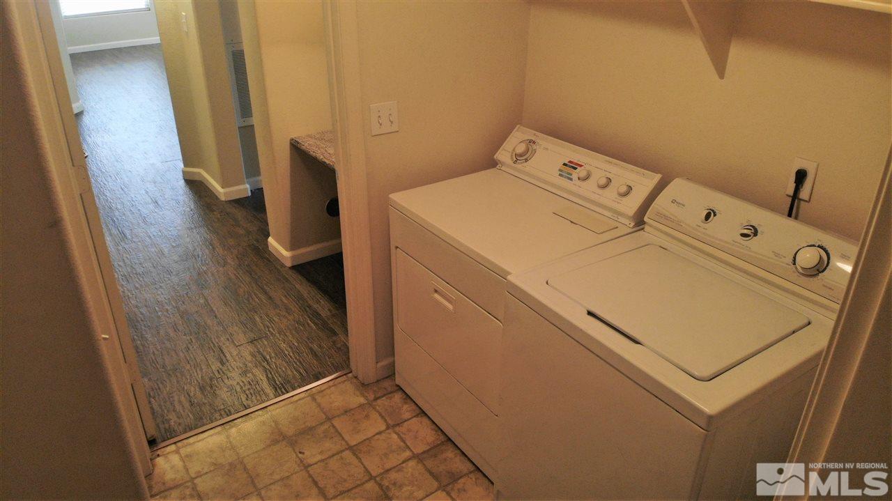 9050 Double R Boulevard, Unit 1612 Reno, NV 89521 - Photo 13 of 25 a utility room with dryer and washer