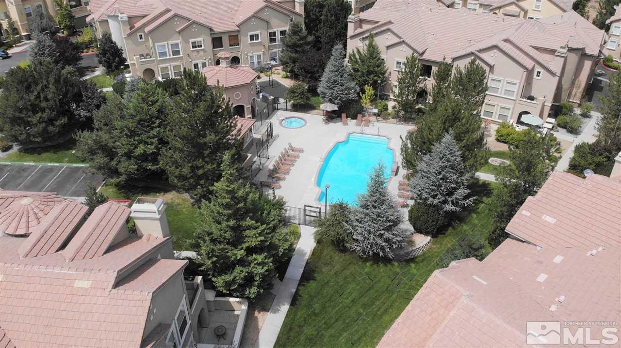 9050 Double R Boulevard, Unit 1612 Reno, NV 89521 - Photo 24 of 25 an aerial view of a house with a swimming pool