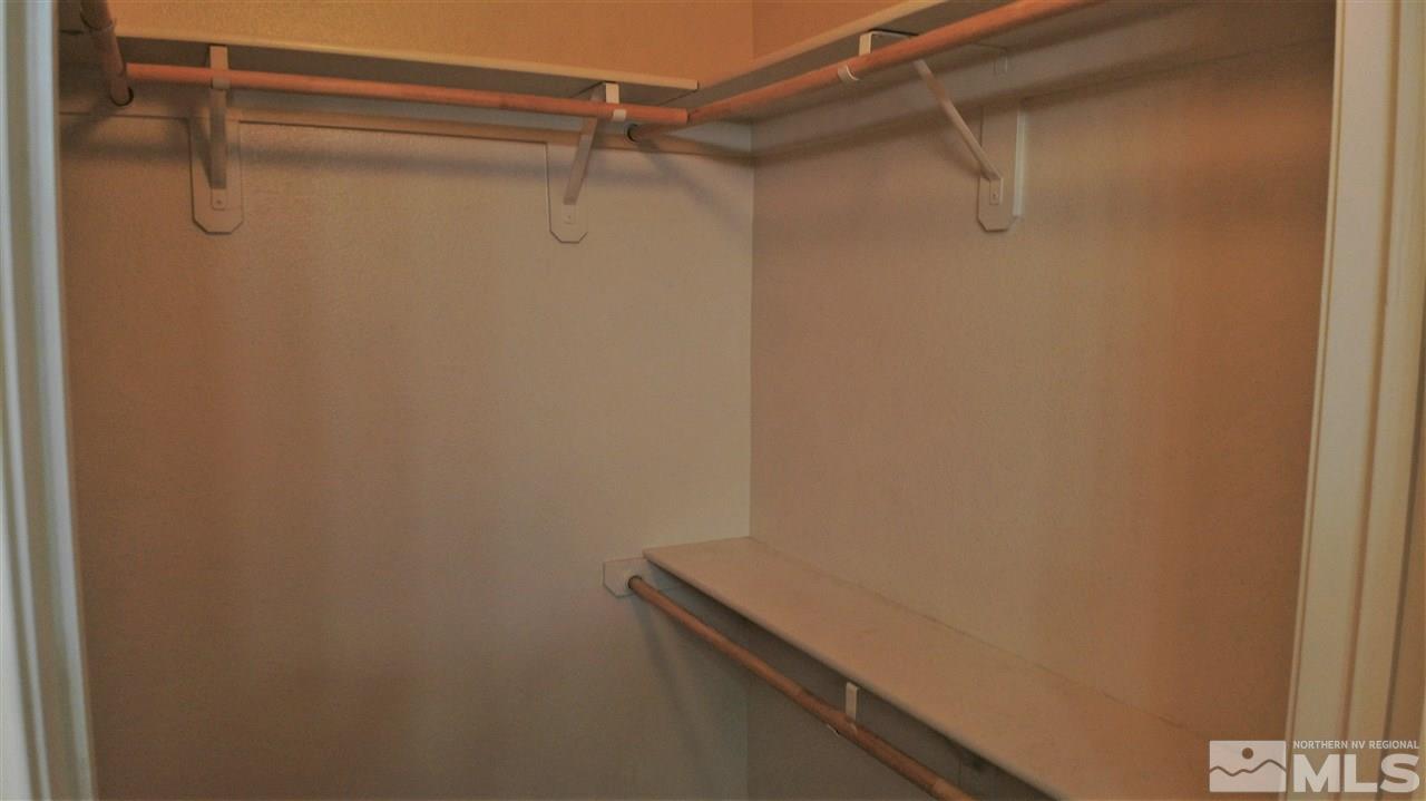 9050 Double R Boulevard, Unit 1612 Reno, NV 89521 - Photo 7 of 25 a view of a room with racks on the wall