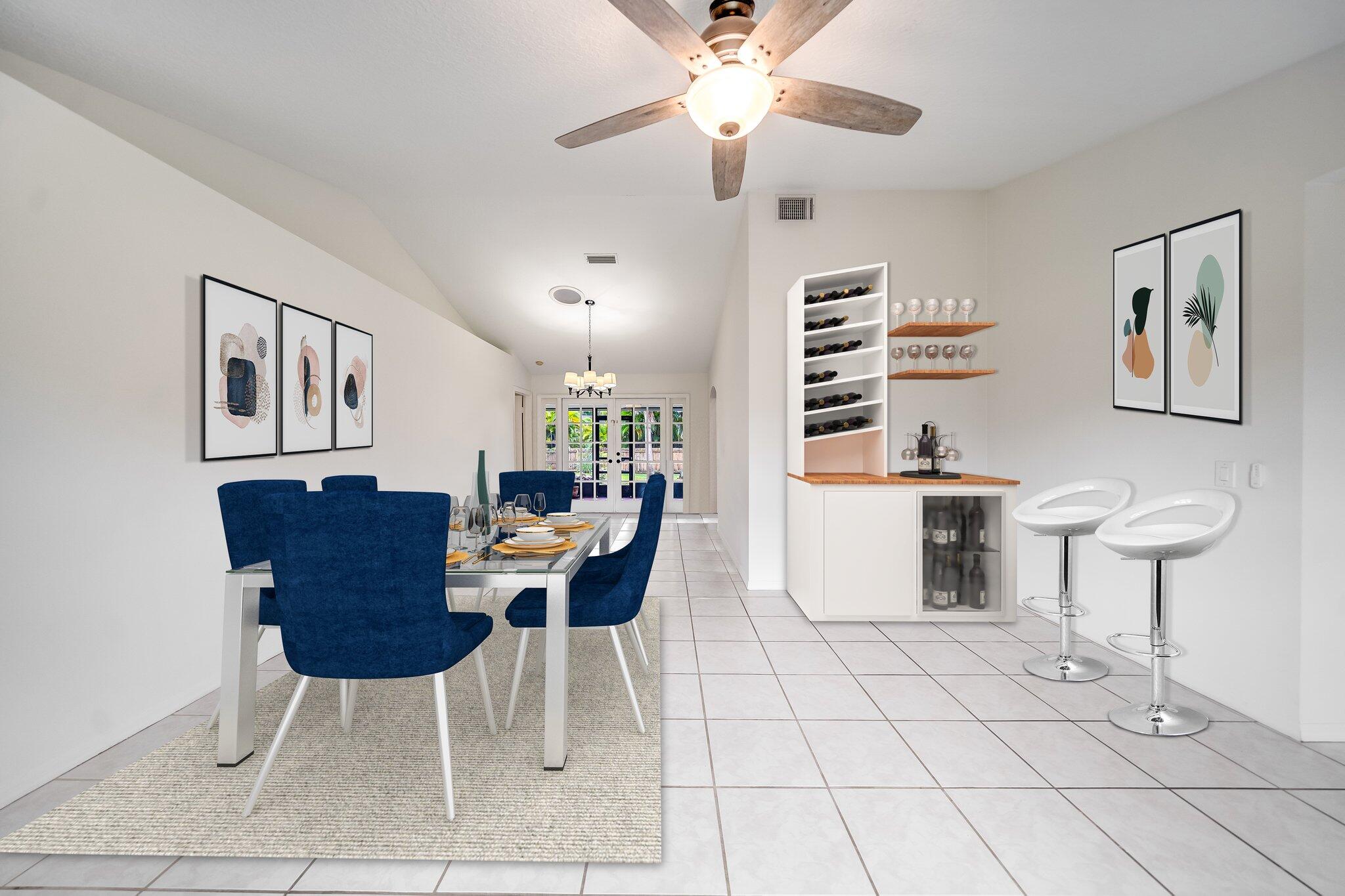 9268 Rodeo Drive Lake Worth, FL 33467 - Photo 15 of 66 a view of a dining room with furniture and chandelier