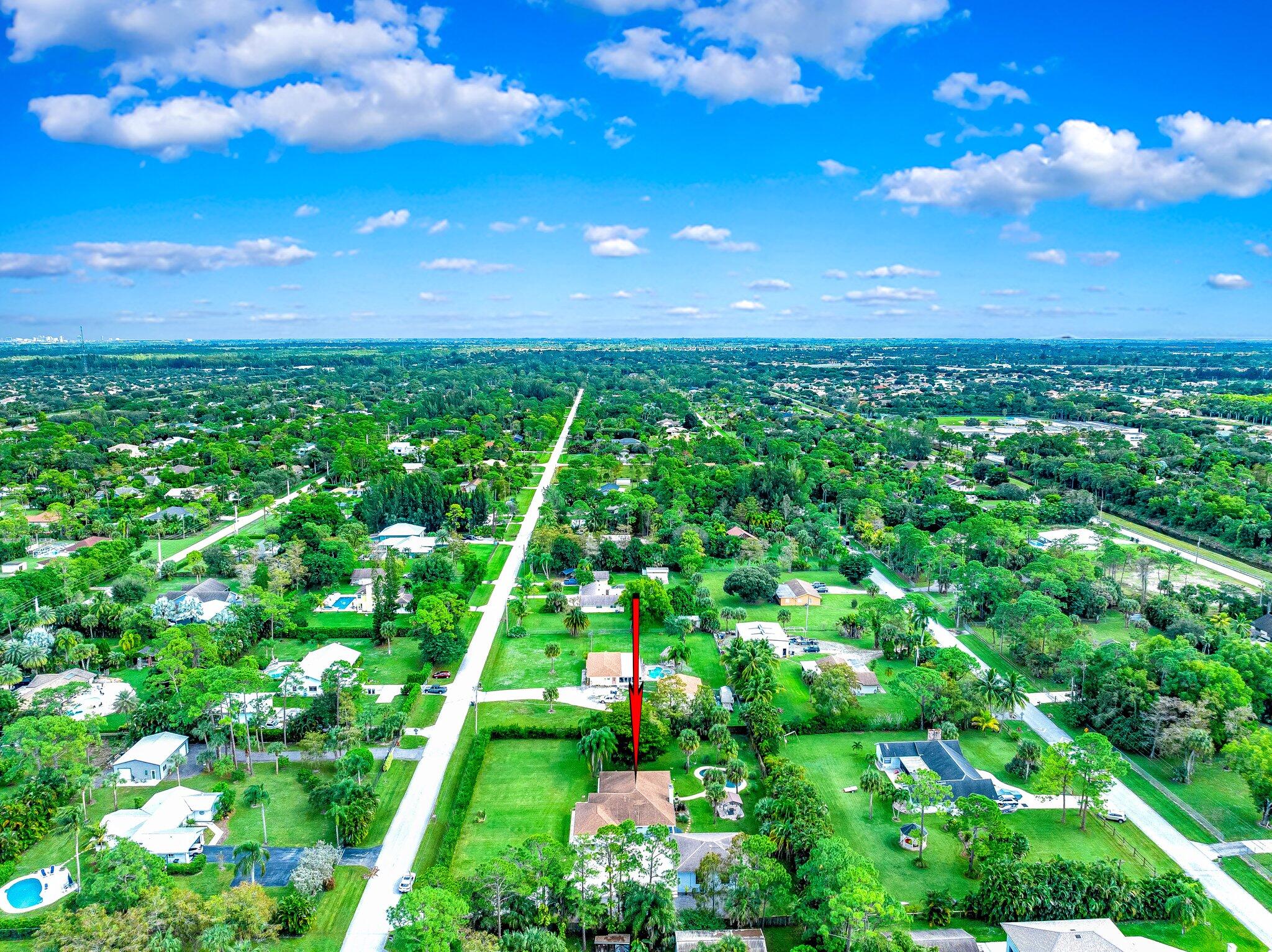 9268 Rodeo Drive Lake Worth, FL 33467 - Photo 61 of 66 a yard with lots of green space