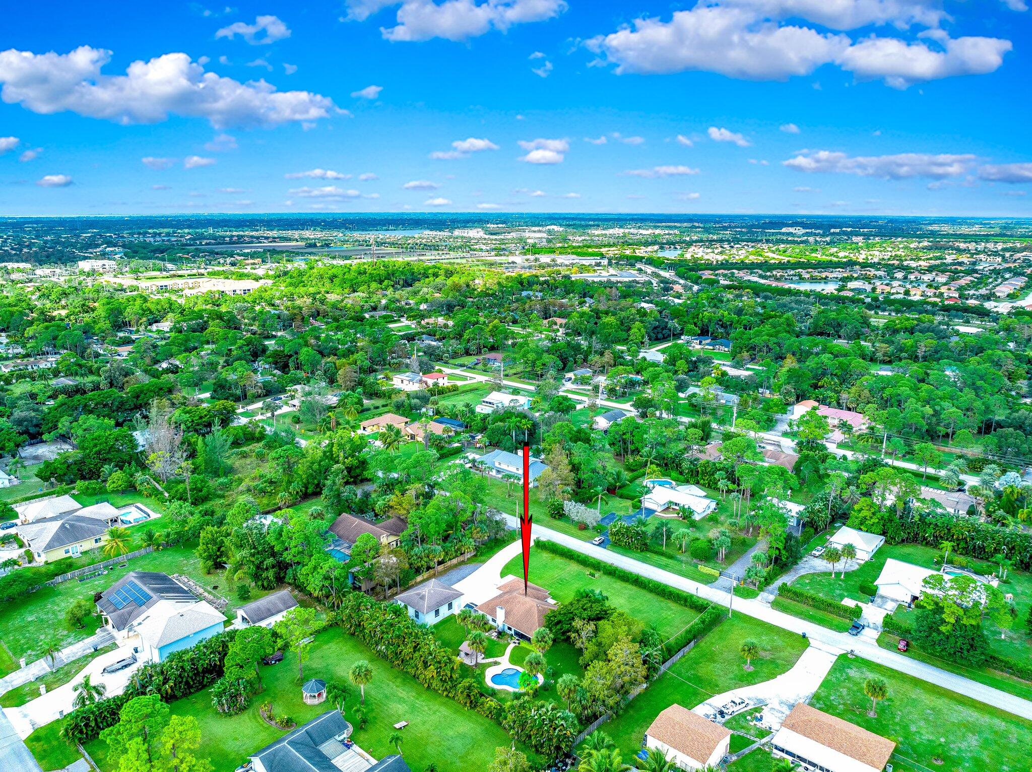 9268 Rodeo Drive Lake Worth, FL 33467 - Photo 64 of 66 a yard with lots of green space