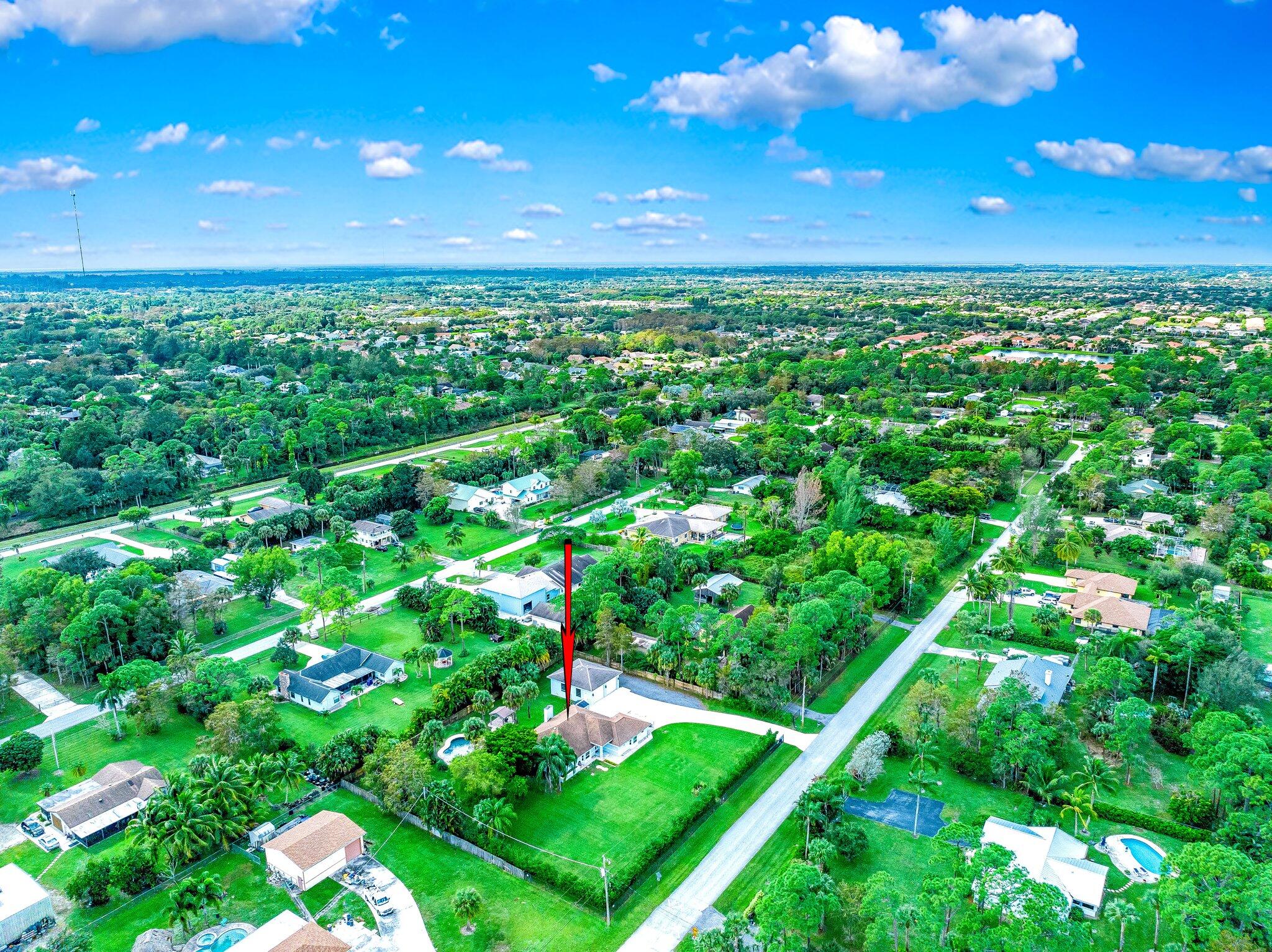 9268 Rodeo Drive Lake Worth, FL 33467 - Photo 65 of 66 a view of yard with swimming pool