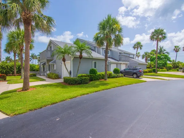 a house with garden in front of it