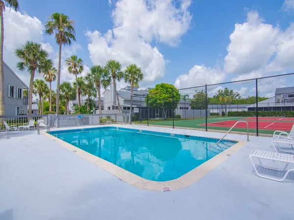 a view of a swimming pool with a patio