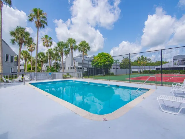 a view of a swimming pool with a patio