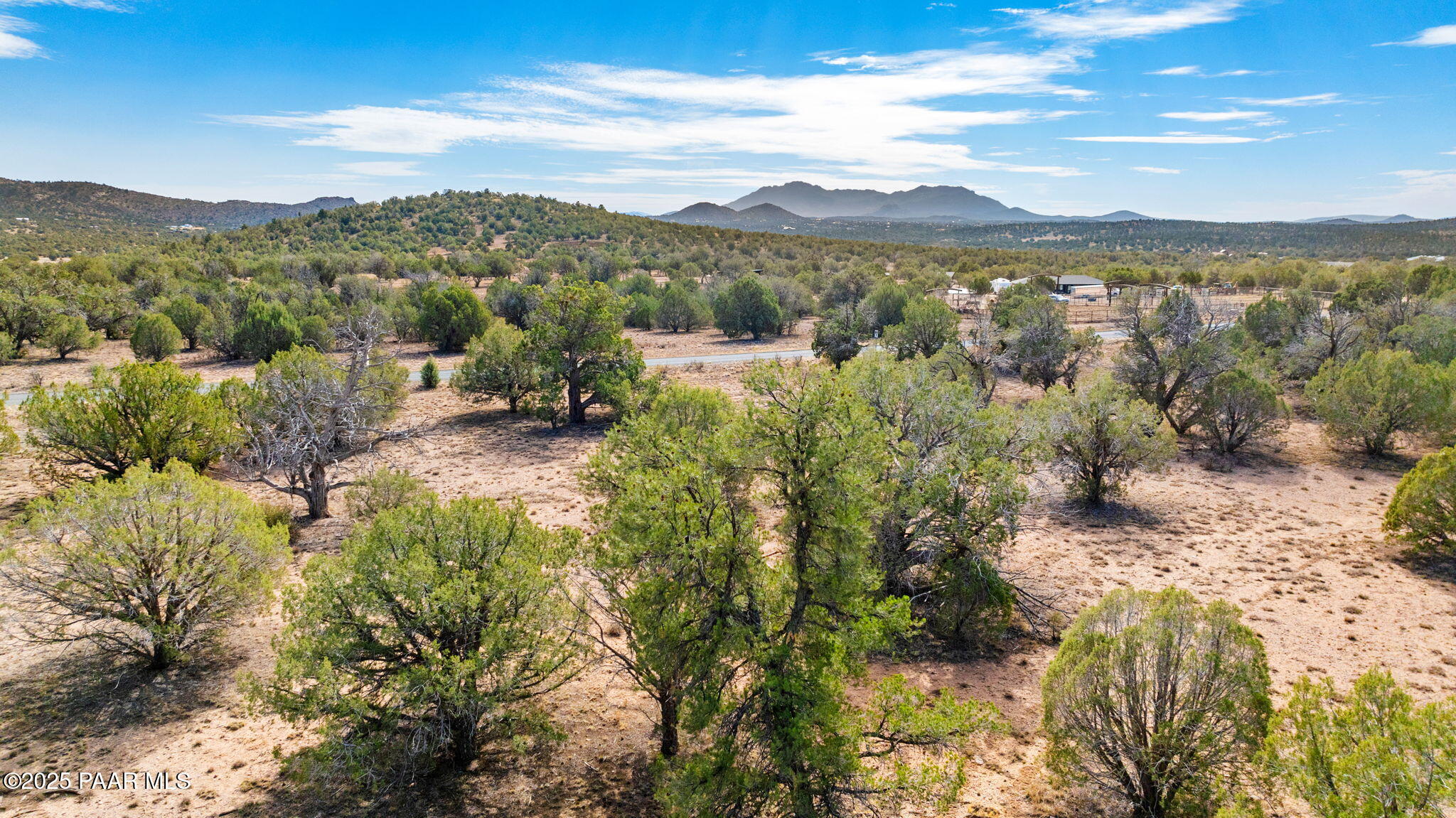 5100 Dillon Wash Road Prescott, AZ 86305 - Photo 5 of 24 a view of a lake with mountains in the background