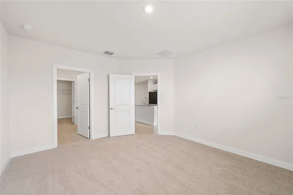a bathroom with a sink a toilet and vanity