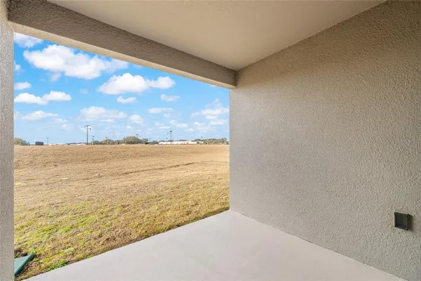 a view of an empty room with window