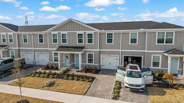 a front view of a house with swimming pool