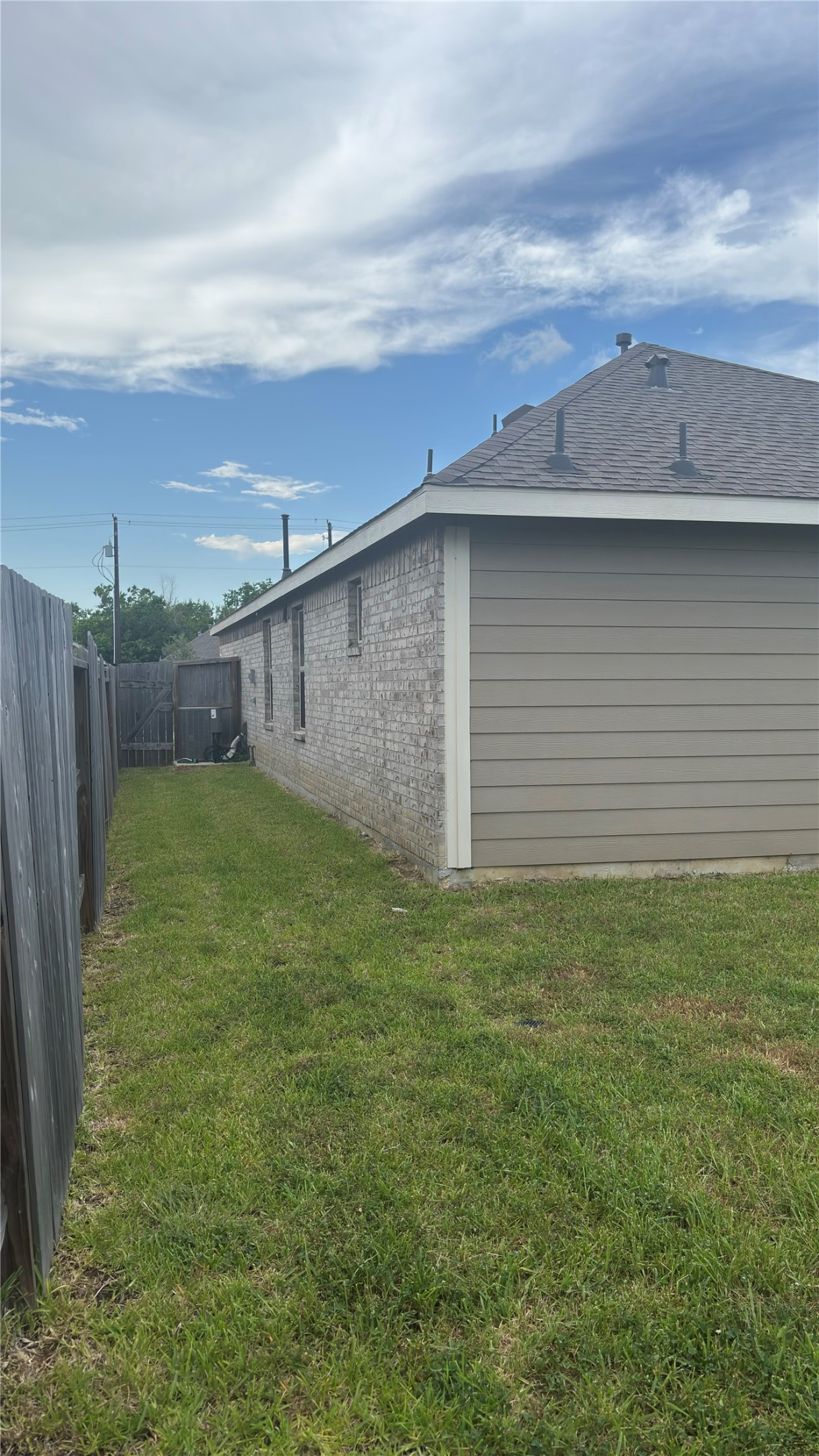 4314 Liberty Ranch Way Baytown, TX 77521 - Photo 28 of 29 a backyard of a house