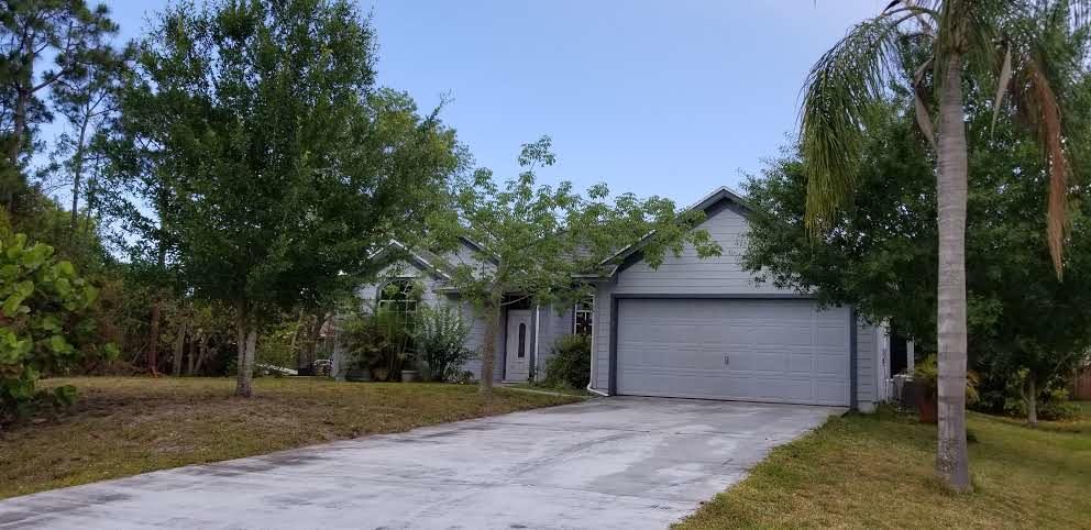 1562 Southwest Gager Road Port St. Lucie, FL 34953 - Photo 39 of 39 Gager exterior of house driveway