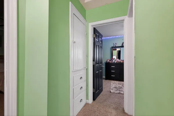 a en suite bathroom with a sink and mirror