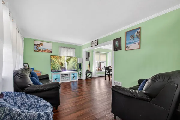 a living room with furniture and a couch