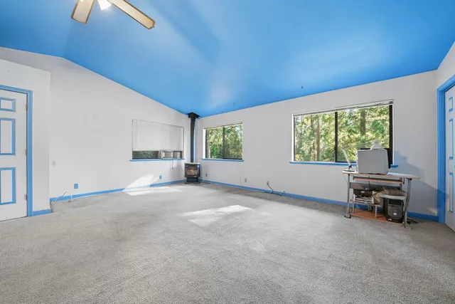a view of livingroom with furniture and window