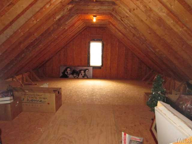 8120 Standing Stone Court Raleigh, NC 27613 - Photo 22 of 25 This is the storage space above the garage, just off the bonus room. This space will provide plenty f storage for holiday decorations, seasonal items, or whatever your storage needs may be! Storage