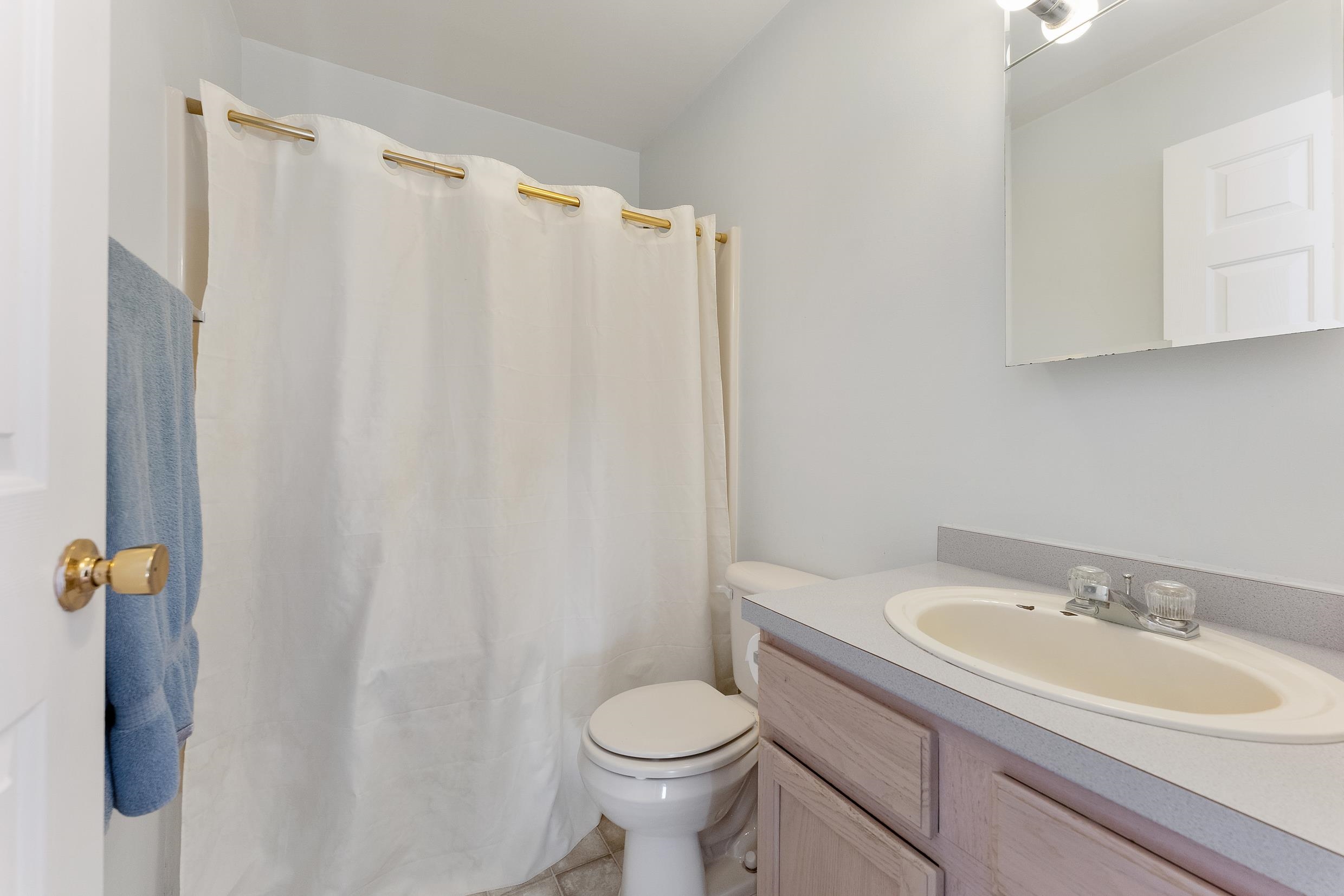 204 Tuckahoe Road Marmora, NJ 08223 - Photo 16 of 19 a bathroom with a sink toilet and a mirror