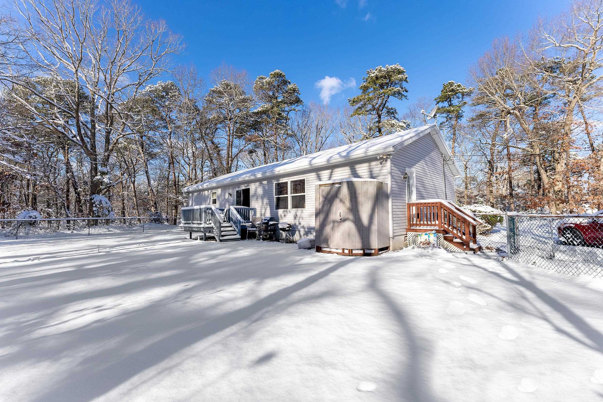 204 Tuckahoe Road Marmora, NJ 08223 - Photo 18 of 19 a view of a house with a snow in the background