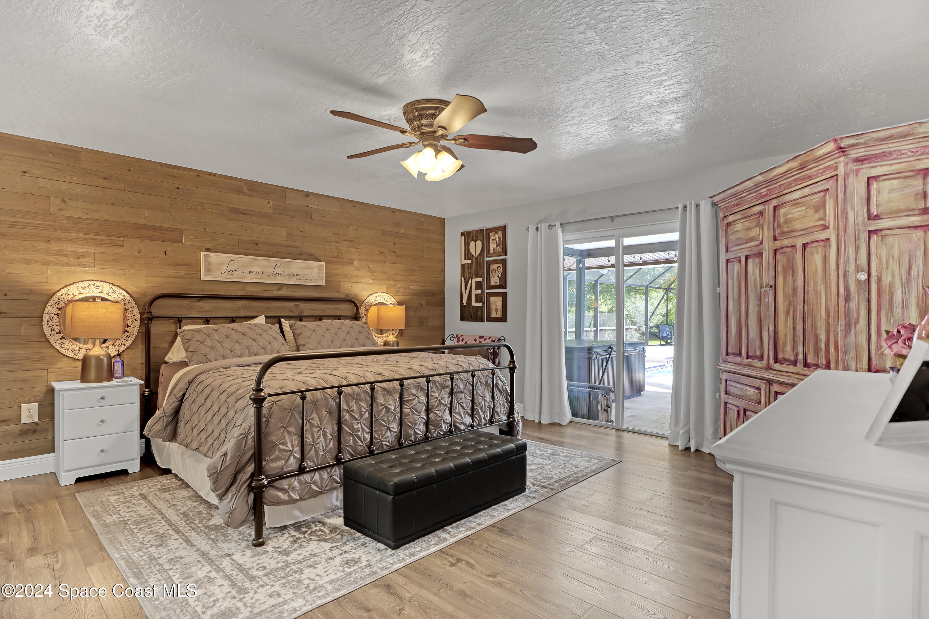 3865 Corey Road Malabar, FL 32950 - Photo 16 of 72 a bedroom with a bed and window