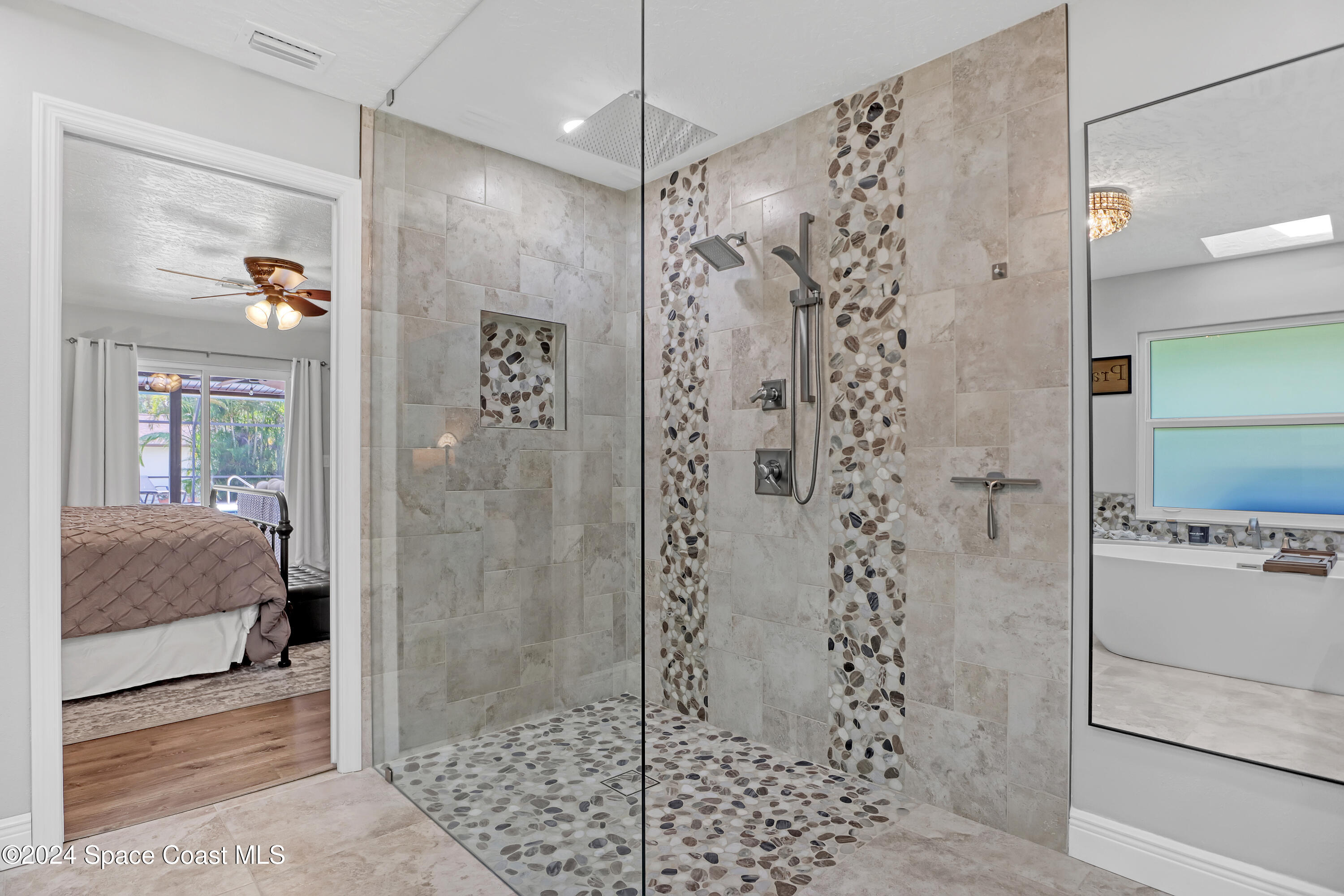3865 Corey Road Malabar, FL 32950 - Photo 20 of 72 a bathroom with a shower and a sink