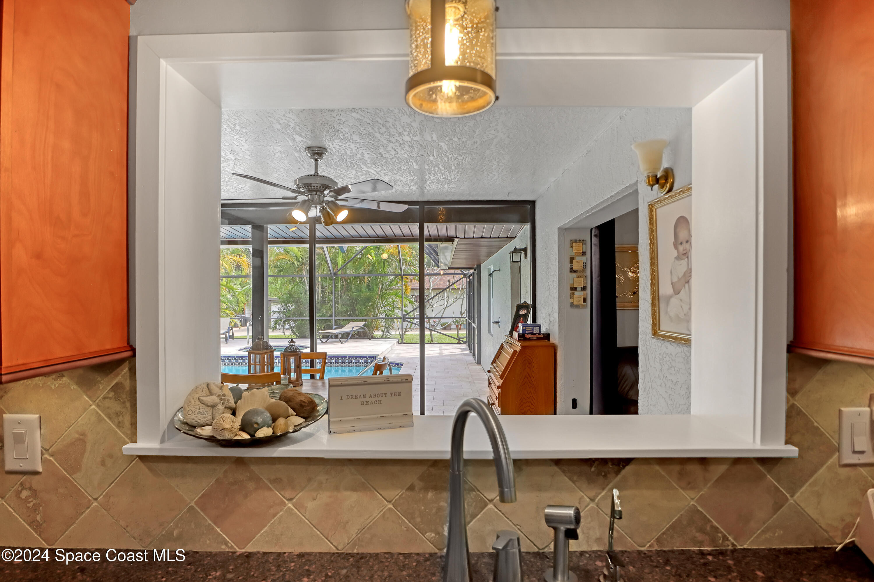 3865 Corey Road Malabar, FL 32950 - Photo 25 of 72 a room with furniture and window