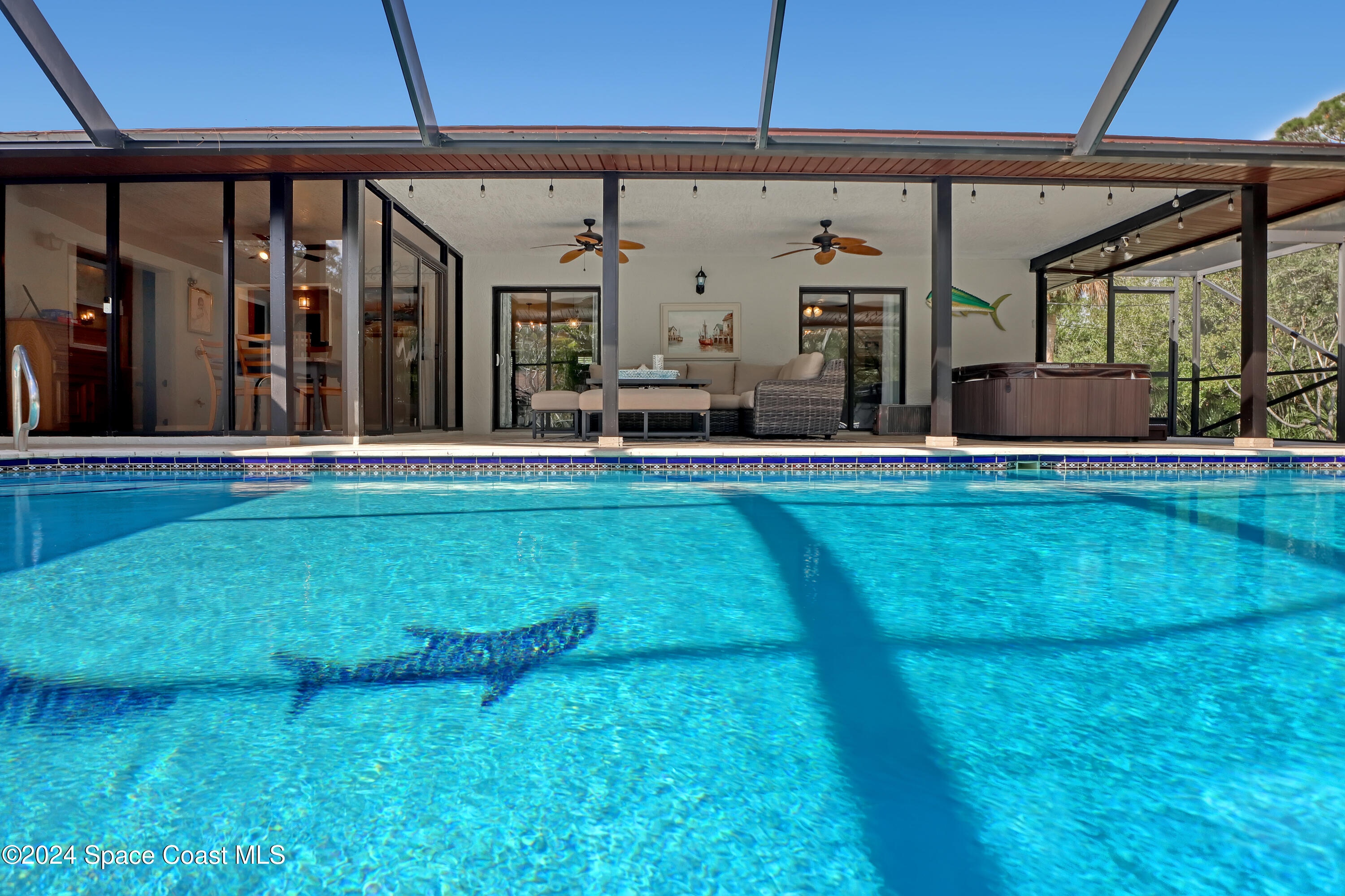 3865 Corey Road Malabar, FL 32950 - Photo 3 of 72 Main home pool view facing the patio