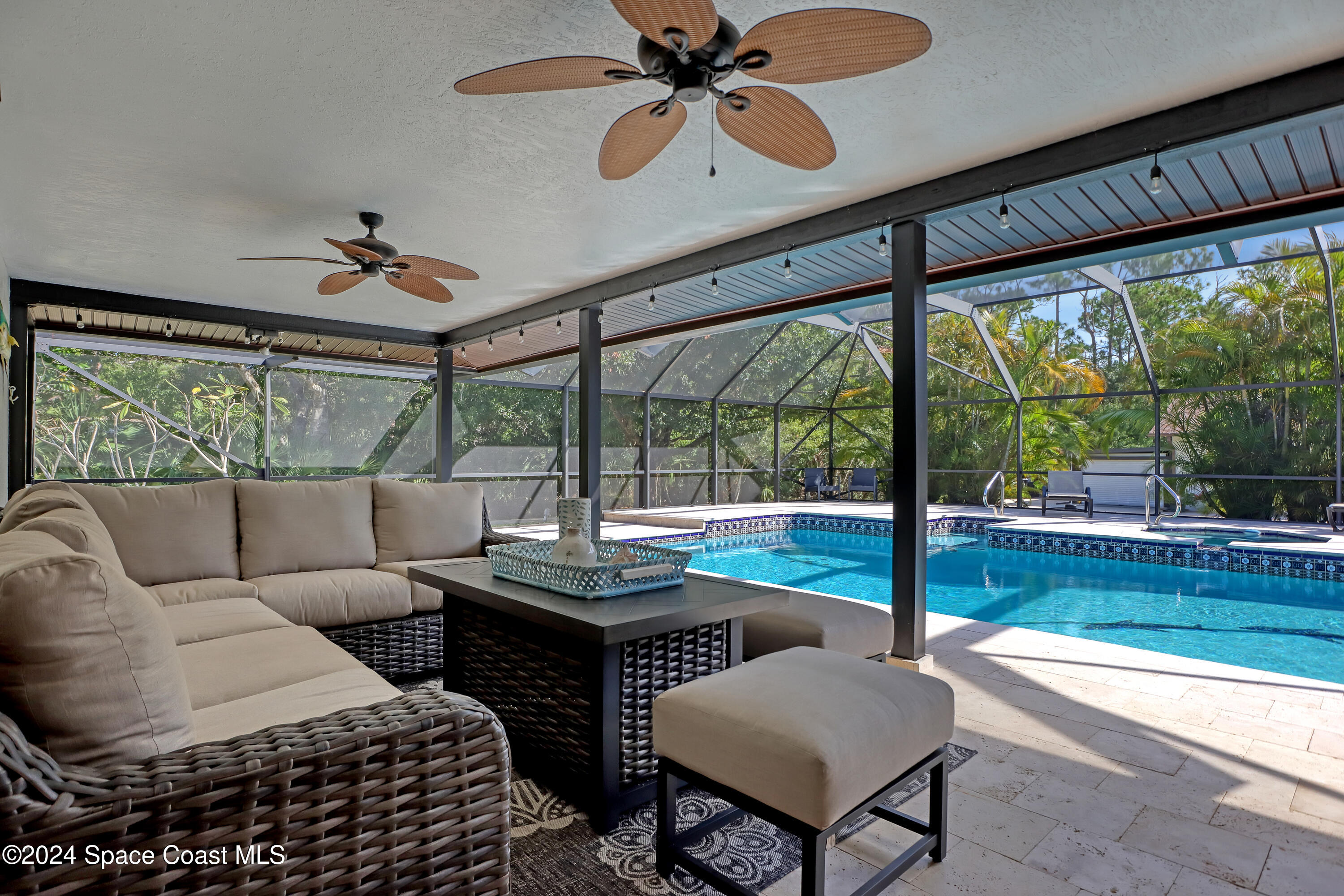 3865 Corey Road Malabar, FL 32950 - Photo 41 of 72 a living room with furniture and a large window