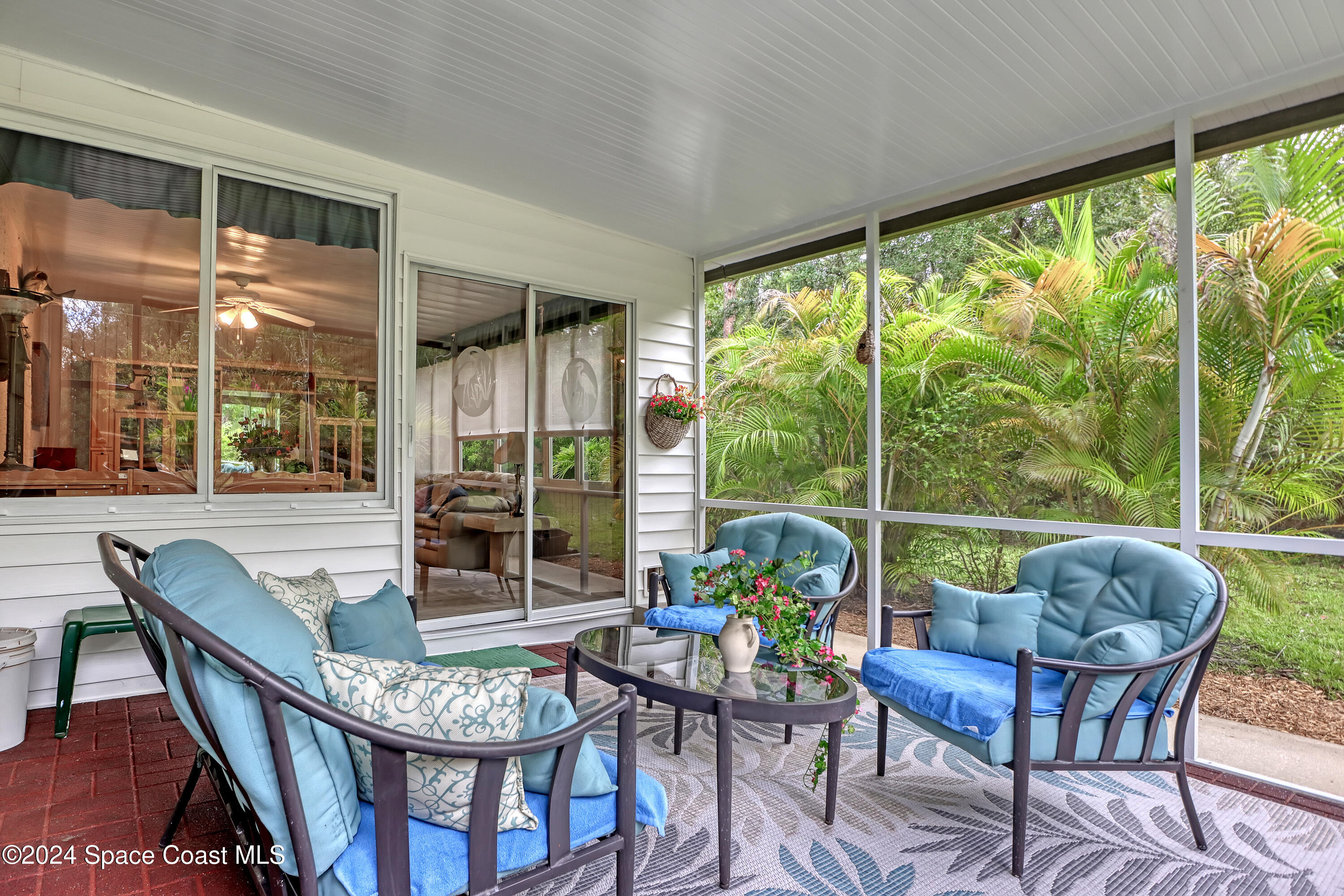 3865 Corey Road Malabar, FL 32950 - Photo 67 of 72 a view of a dining room with furniture window and outside view