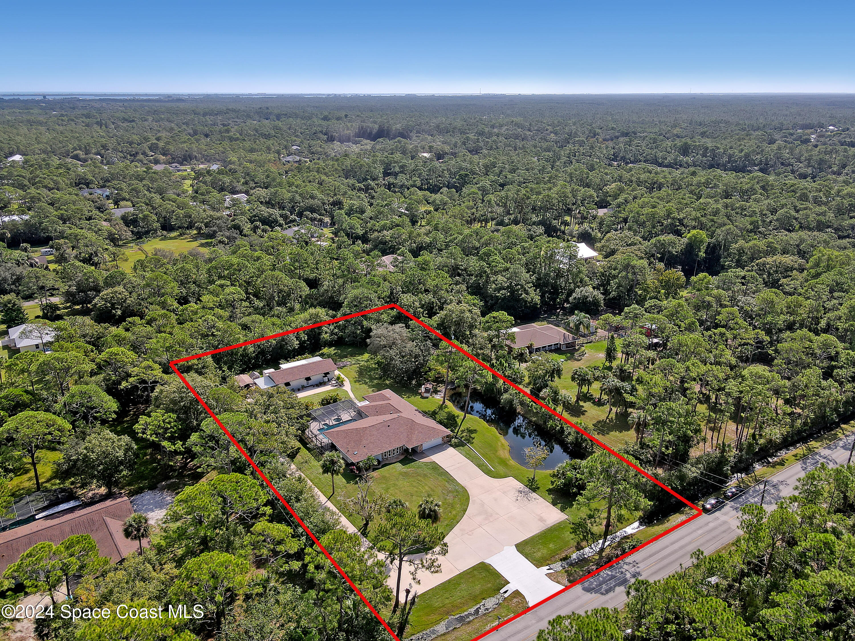3865 Corey Road Malabar, FL 32950 - Photo 7 of 72 an aerial view of a city