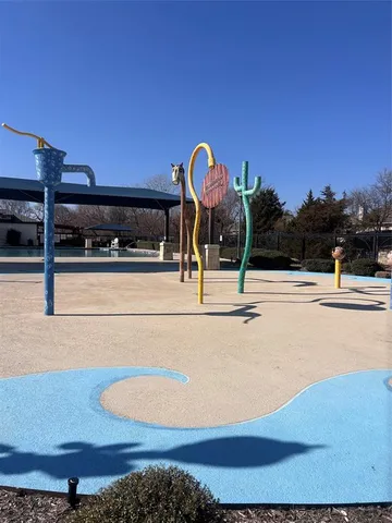 a view of a swimming pool with seating area
