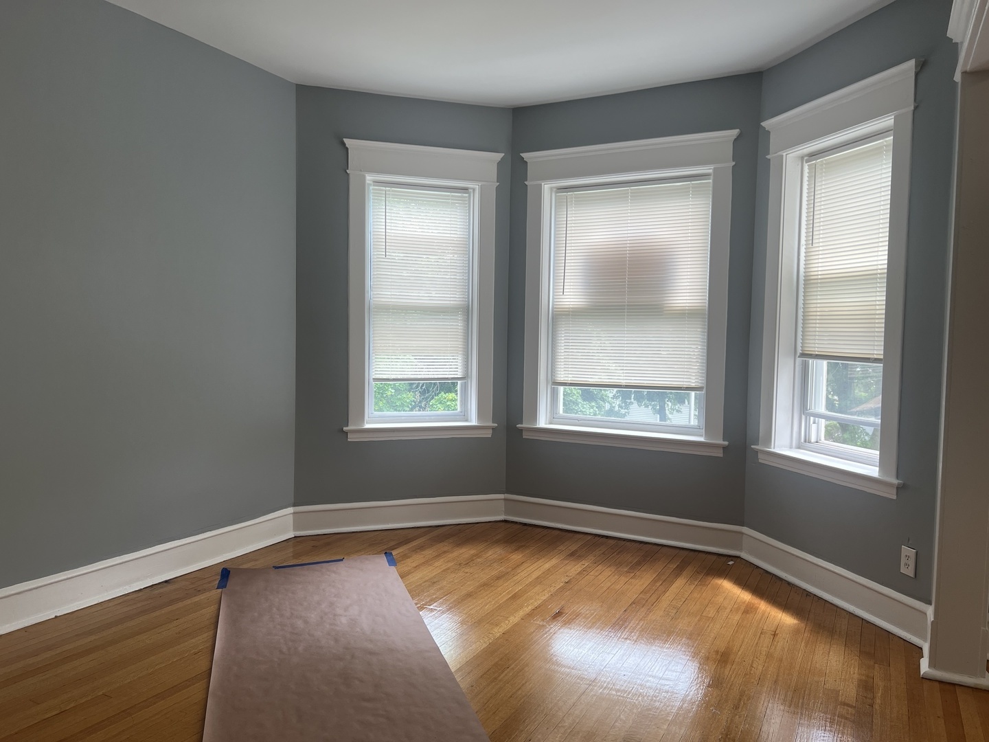 208 North Waller Avenue, Unit 2N Chicago, IL 60644 - Photo 7 of 10 a view of empty room with window