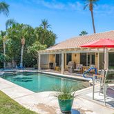 a view of a house with swimming pool