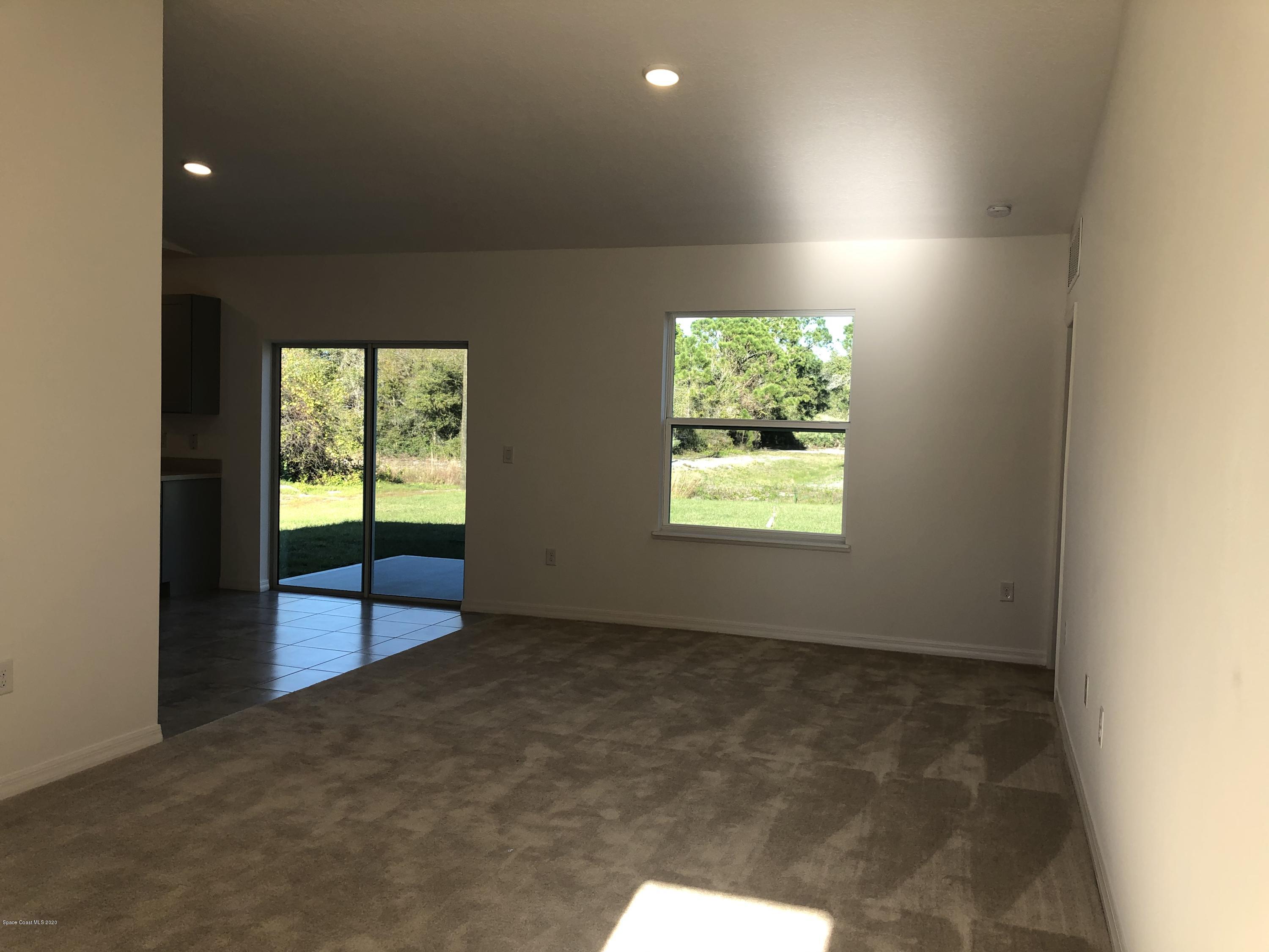 1481 Paragon Road Southeast Palm Bay, FL 32909 - Photo 4 of 9 31090799-5e388d1c49dd8