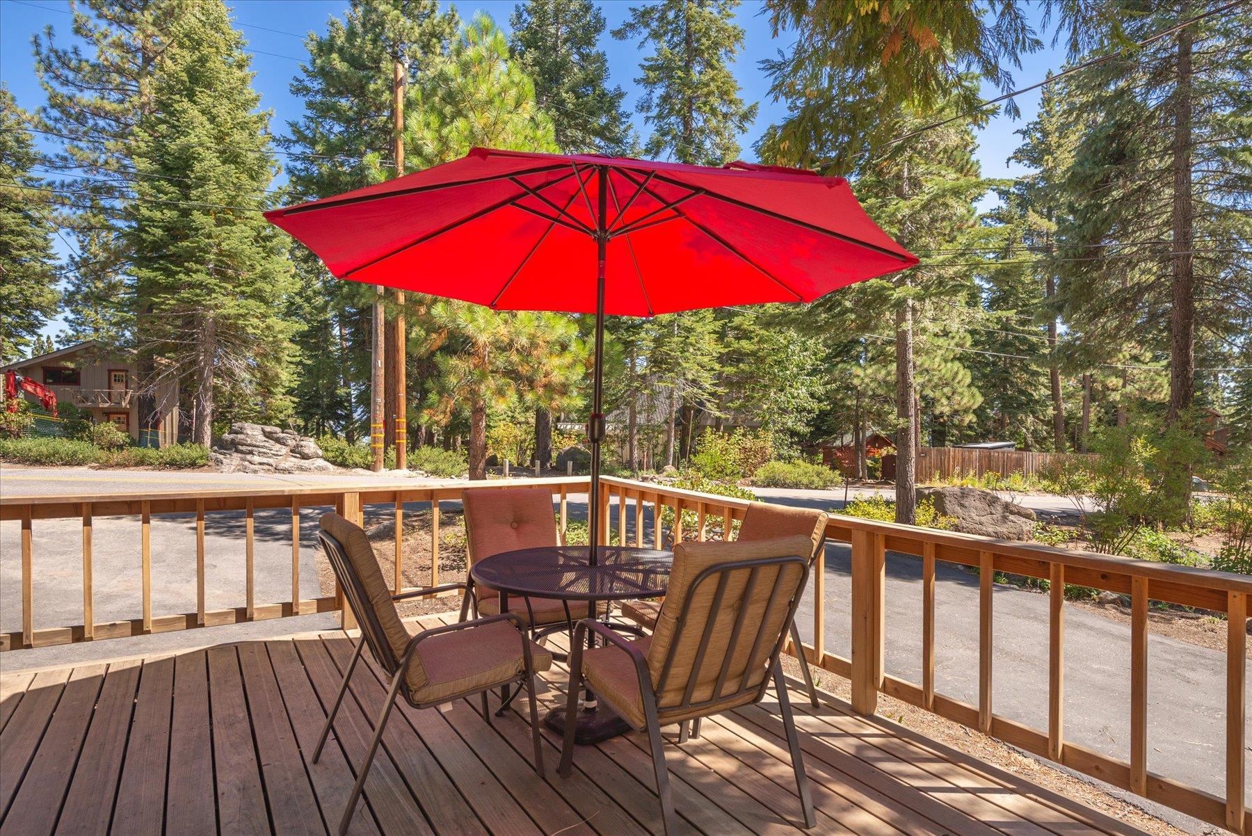 265 Old County Road Carnelian Bay, CA 96140 - Photo 12 of 28 a view of balcony with outdoor seating and wooden floor