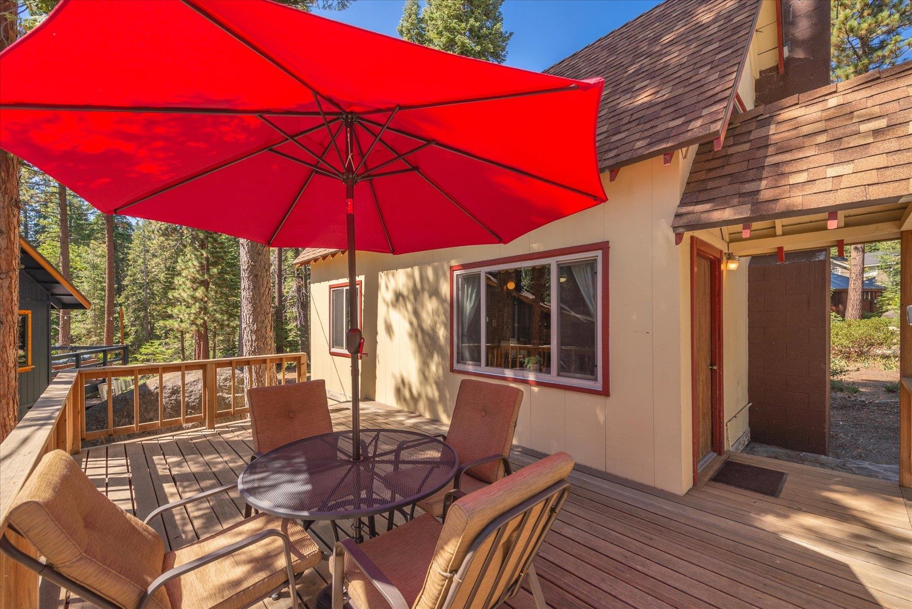 265 Old County Road Carnelian Bay, CA 96140 - Photo 13 of 28 a view of a house with backyard porch and sitting area