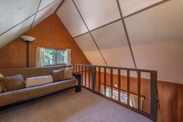a view of a living room and a couch in a living room