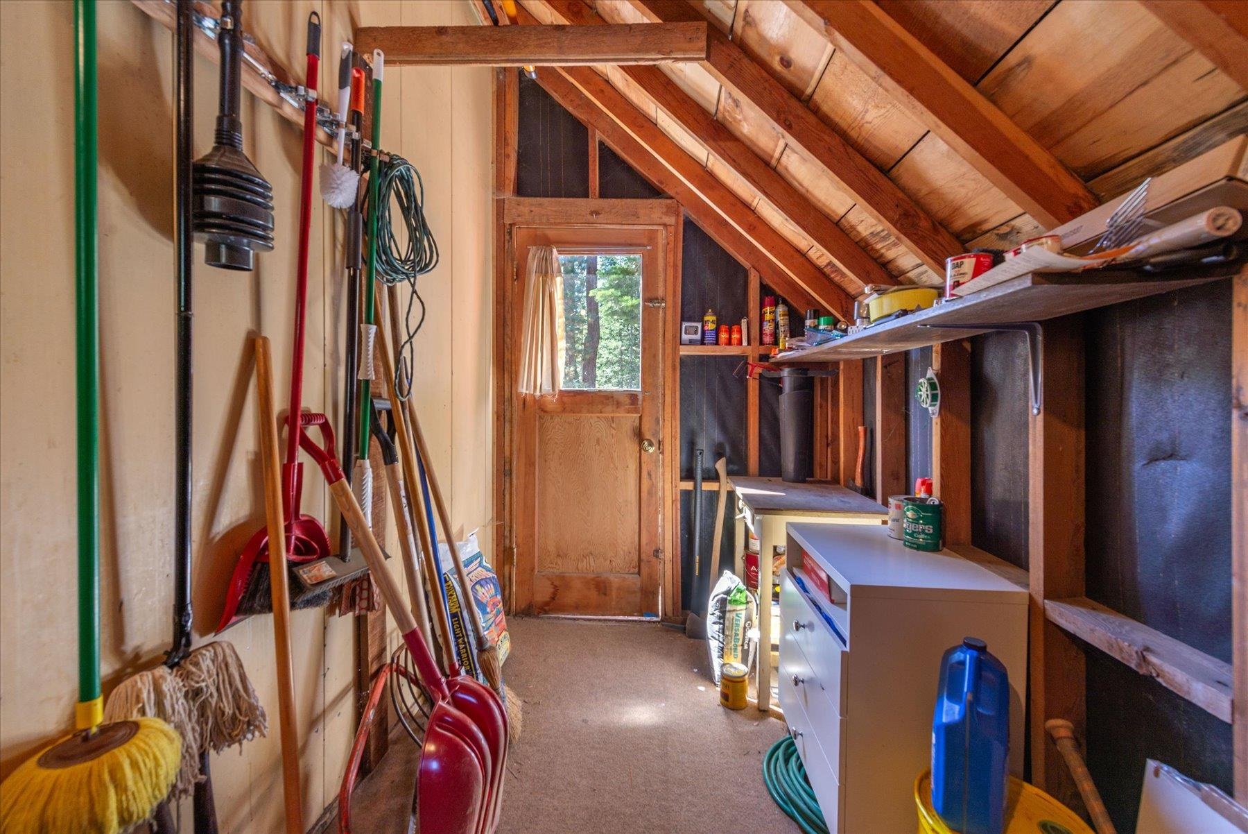 265 Old County Road Carnelian Bay, CA 96140 - Photo 27 of 28 a view of walk in closet with clothes and shoes
