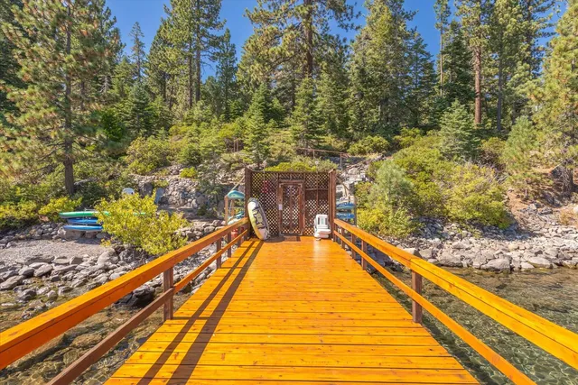 a view of swimming pool with seating area