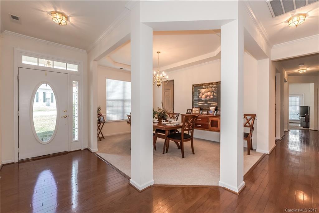 242 Garnet Court Fort Mill, SC 29708 - Photo 4 of 22 a view of a livingroom with furniture and hardwood floor