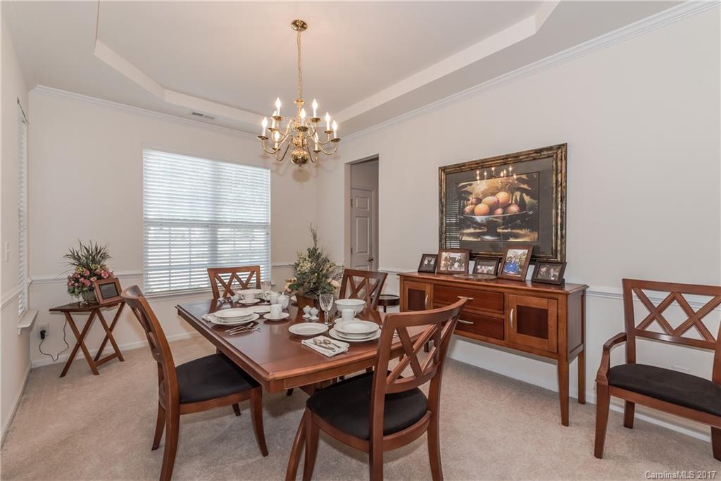 242 Garnet Court Fort Mill, SC 29708 - Photo 5 of 22 a view of a dining room with furniture window and outside view