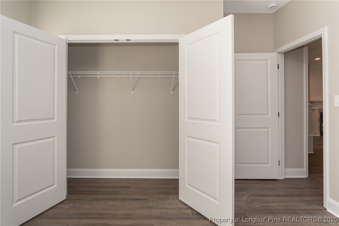 229 August Lane Raeford, NC 28376 - Photo 25 of 39 an empty room with wooden floor