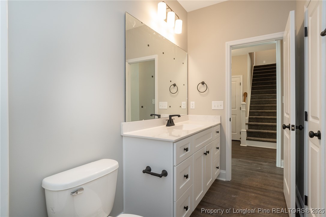 229 August Lane Raeford, NC 28376 - Photo 27 of 39 a bathroom with a sink a toilet and shower