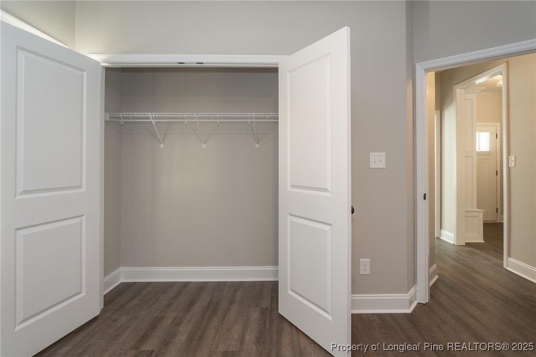229 August Lane Raeford, NC 28376 - Photo 30 of 39 an empty room with wooden floor & closet area