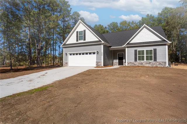 a house with trees in the background