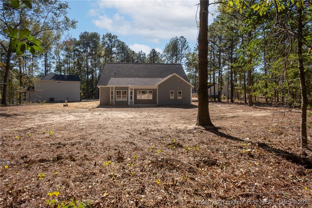 229 August Lane Raeford, NC 28376 - Photo 38 of 39 a view of a house with a yard