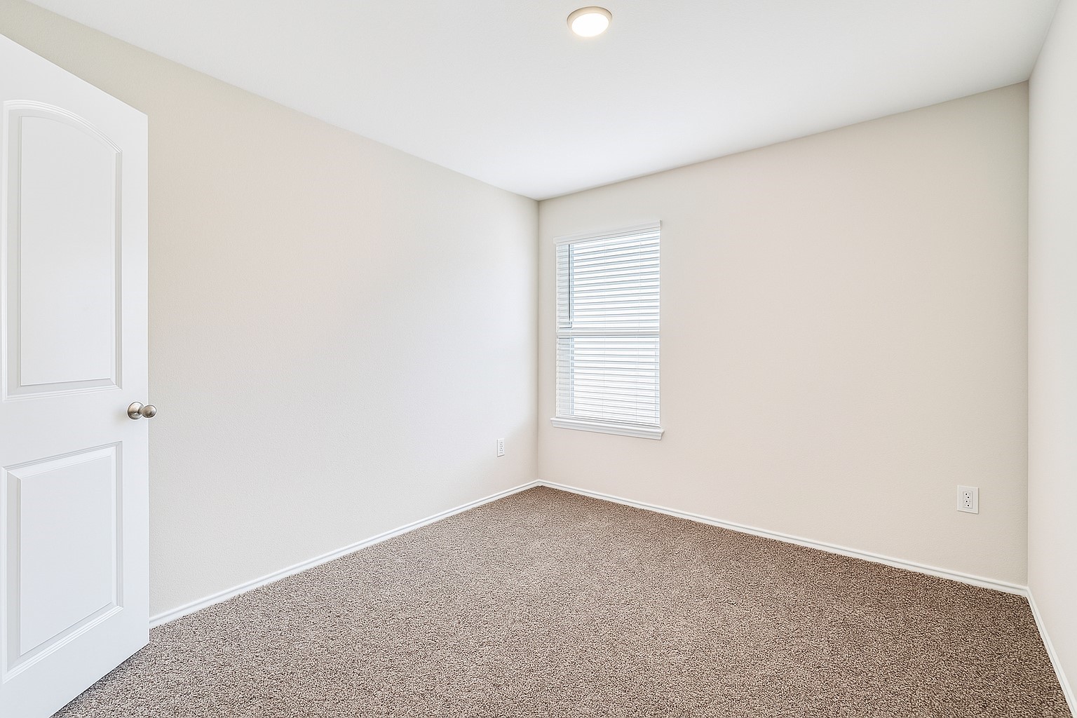 5611 Simcrest Grove Drive Spring, TX 77373 - Photo 13 of 18 an empty room with a empty space and a window