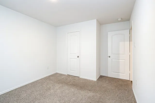 a view of a room that has a window in it